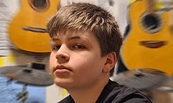 DANIEL K.