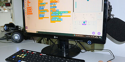 Foto Scratch-Programmierworkshop in der Feierwerk Funkstation. Zu sehen ist ein Desktop-PC mit Tastatur.
